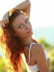 Petite curly redhead teen Kesy stripping outdoors