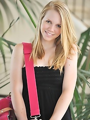 Courtney plays with her toys